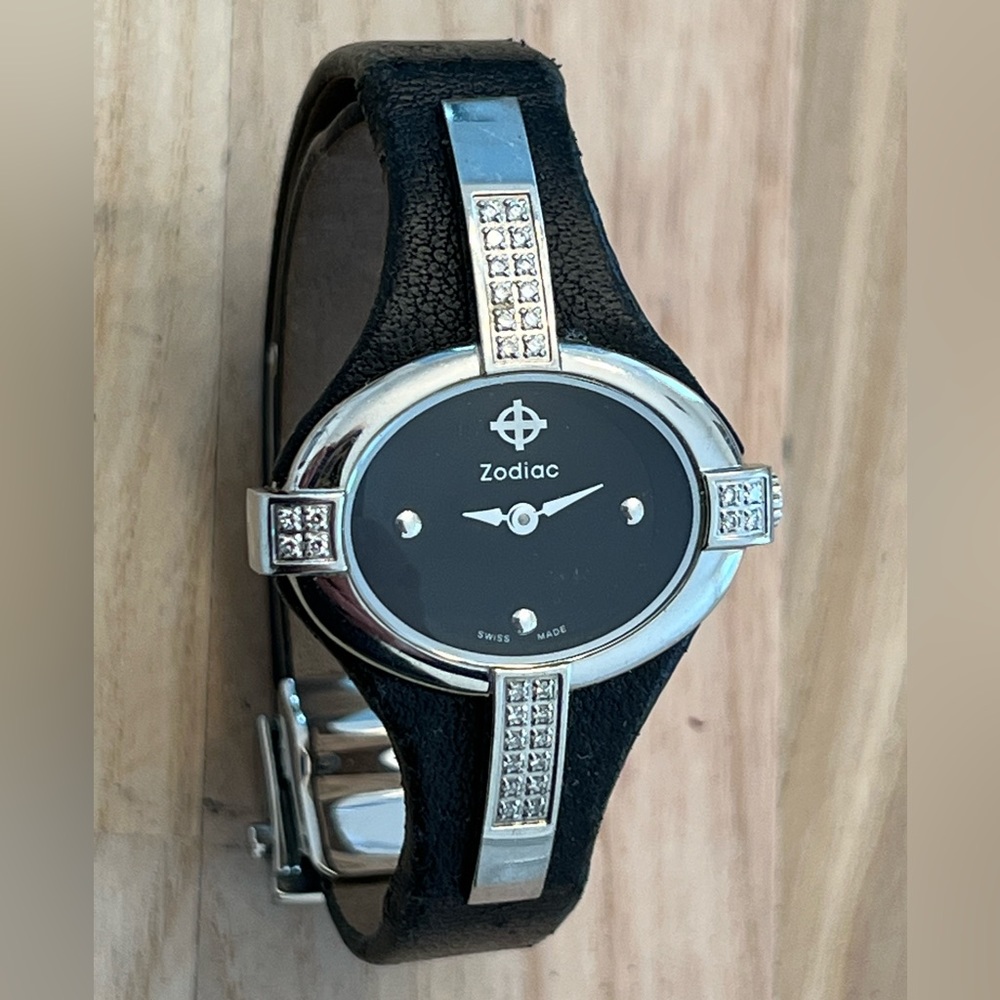 Zodiac Ladies Watch Ultra Rare Diamonds Oval Black Dial Black Leather Stainless